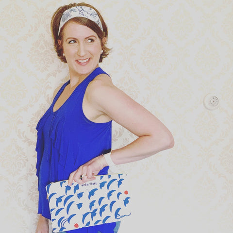 Laura Lynn Michaud CEO at The Maine Square carrying an Erin Flett Zipper Clutch