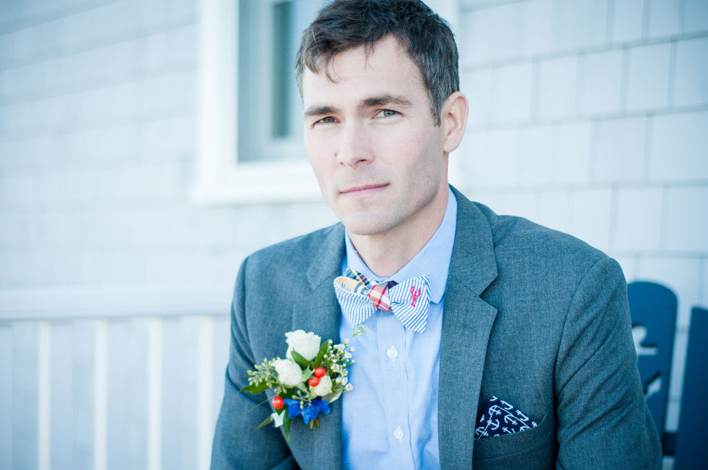 Pocket square worn with boutonnière 