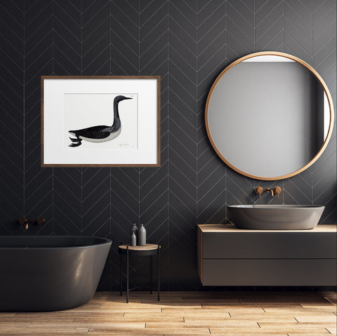 Rudbeck's black diver bird print in a monochromatic grey bathroom.