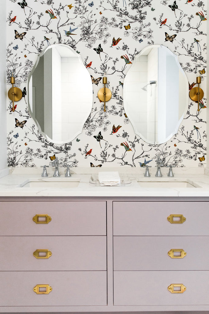 girl's bathroom with Schumacher bird and butterfly wallpaper