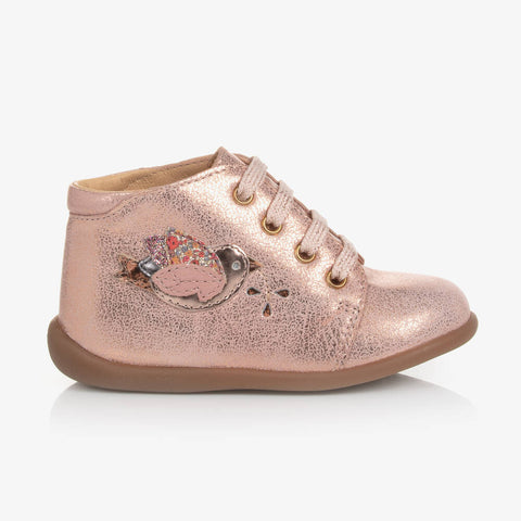 Pink toddler's first shoes with bird decoration