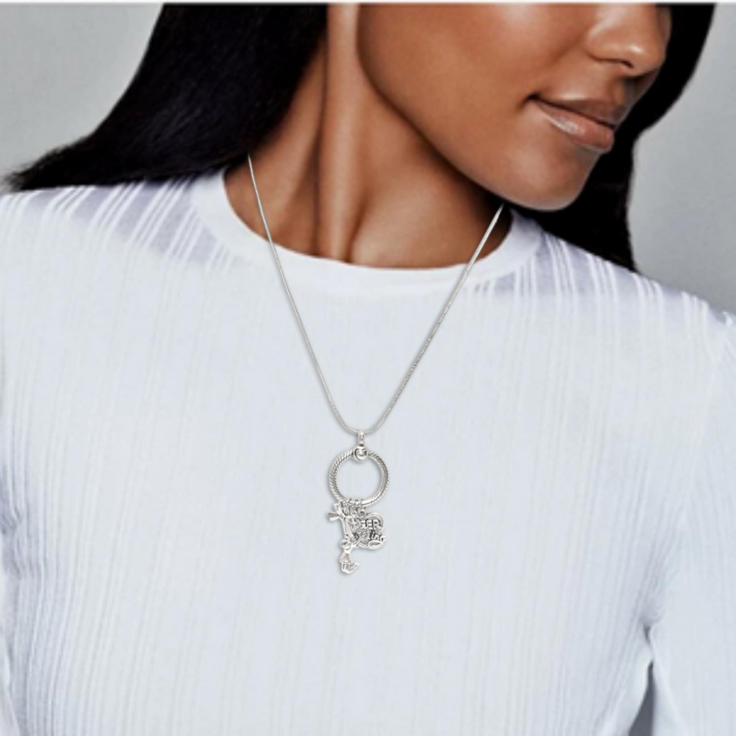 James Avery Artisan Jewelry - The new Hammered Circle Changeable Charm  Holder Necklace (available in sterling silver or 14K gold) is stylish with  or without charms so you can change up your