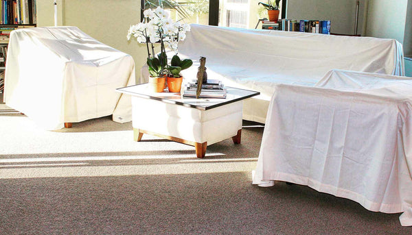 Furniture In Sun Filled Living Room Protected By Cotton Dust Sheets From The Butler's Closet