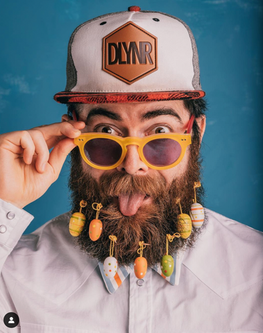 man with easter ornaments in his beard