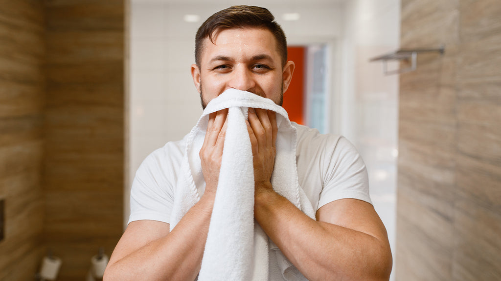 Beard being towel dried after washing