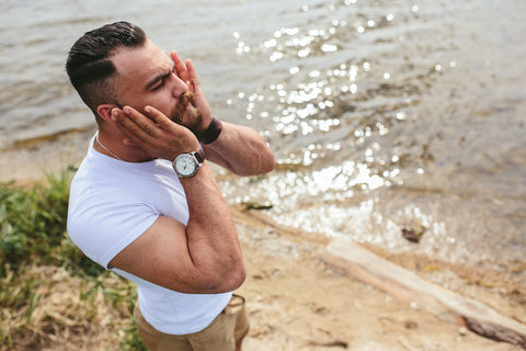 Man using beard oil or balm