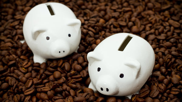 coffee beans and piggy banks