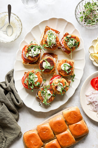 halibut sliders being assembled on a plate 