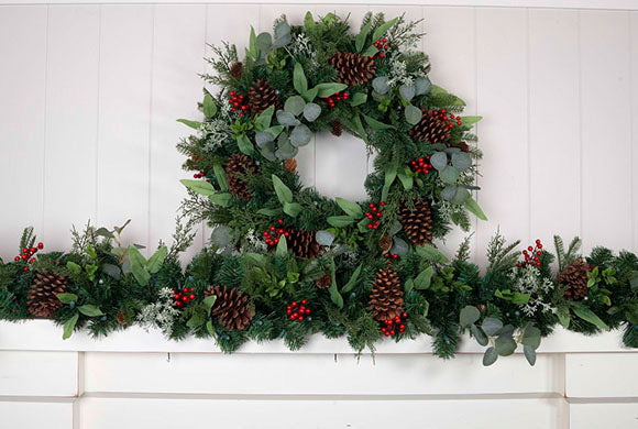  Christmas Woods Wreath and Garland Hanging Above Fireplace Mantle