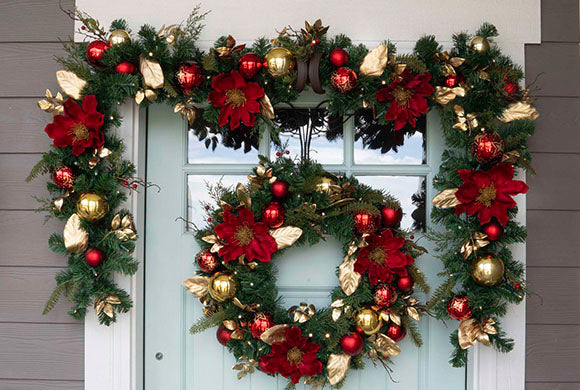 Golden Leaf Red Magnolia Wreath and Garland Hanging On Front Door