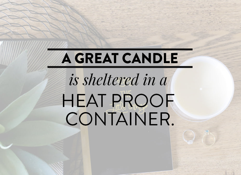 A great candle is sheltered in a heatproof container.