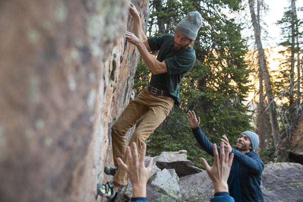 A climber starts on a new problem, wearing his ultralight belt for best performance. 