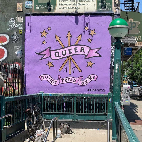 queer AF don't tread on me ribbon arrow street art subway stop rose cory