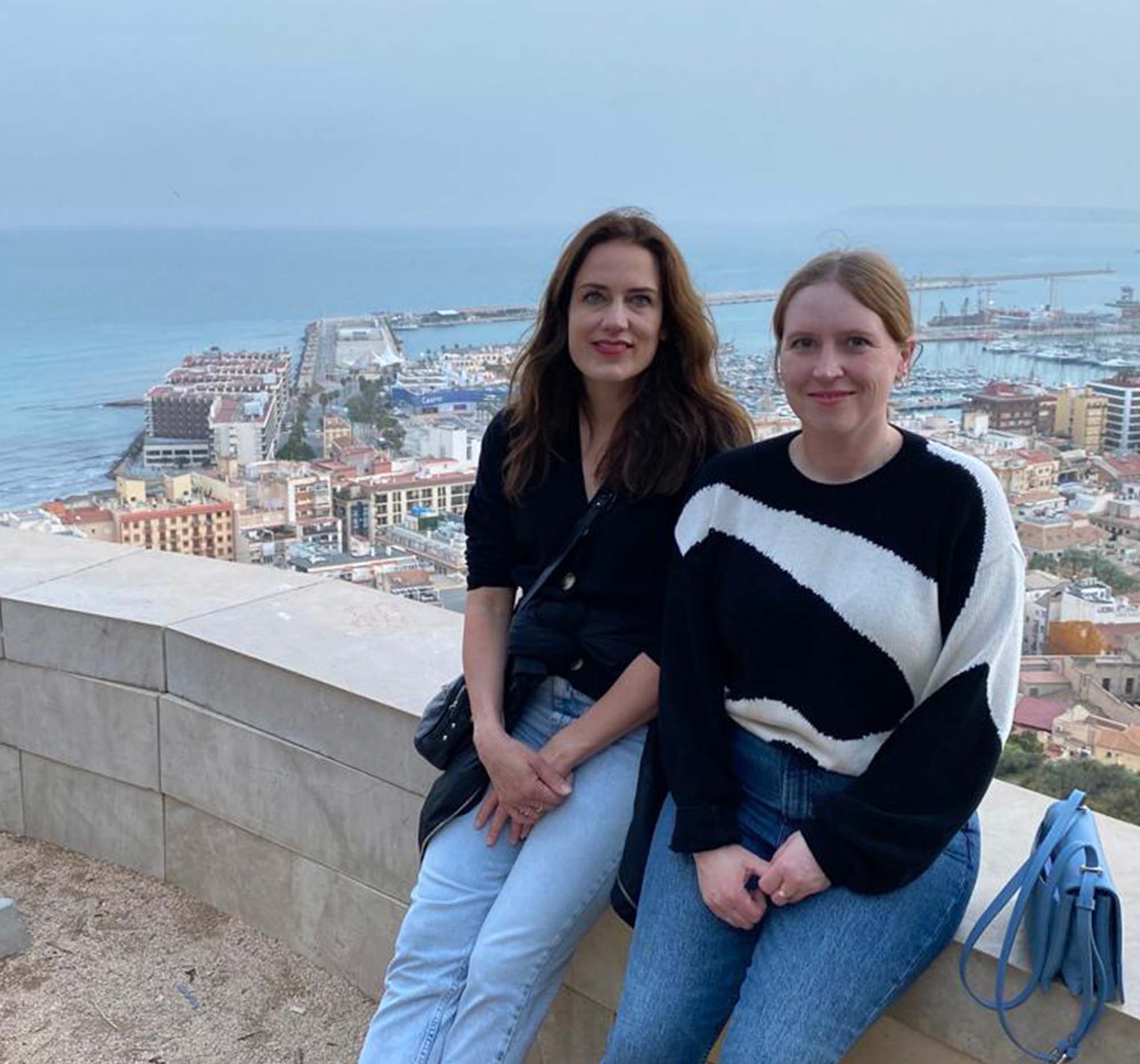 Kalie and Justine at a lookout in Spain