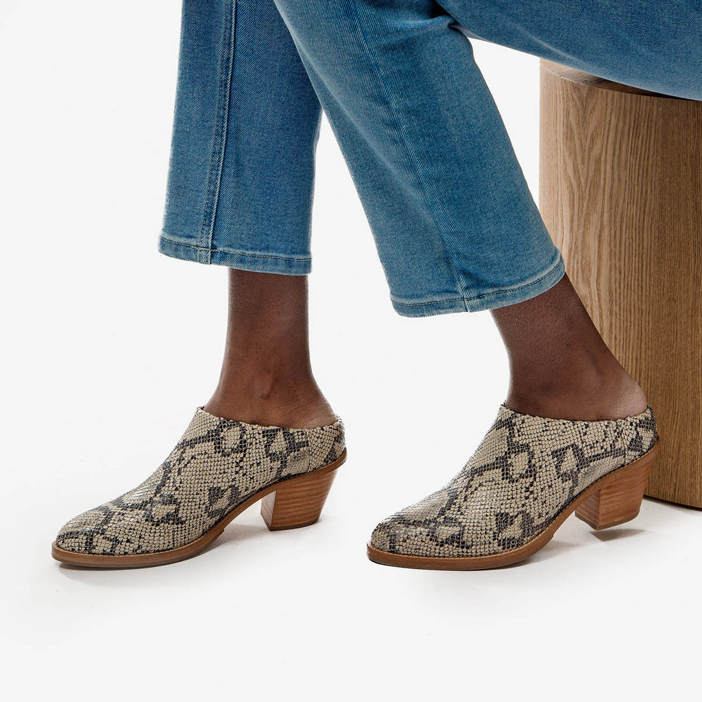 snake print heeled mules