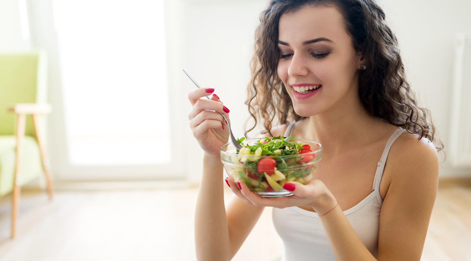 Woman eating a salad 