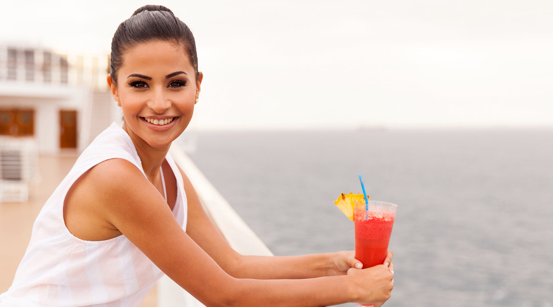 woman on cruise ship with drink