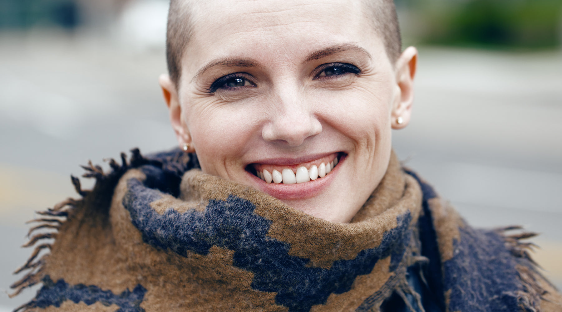 smiling woman with scarf