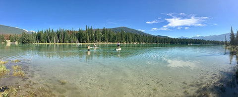 Clear water and paddle boards