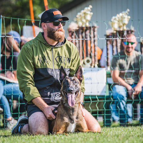 Jared Wolf and Akuma the Belgian Malinois