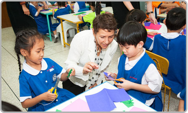 Agnes with students in the classroom