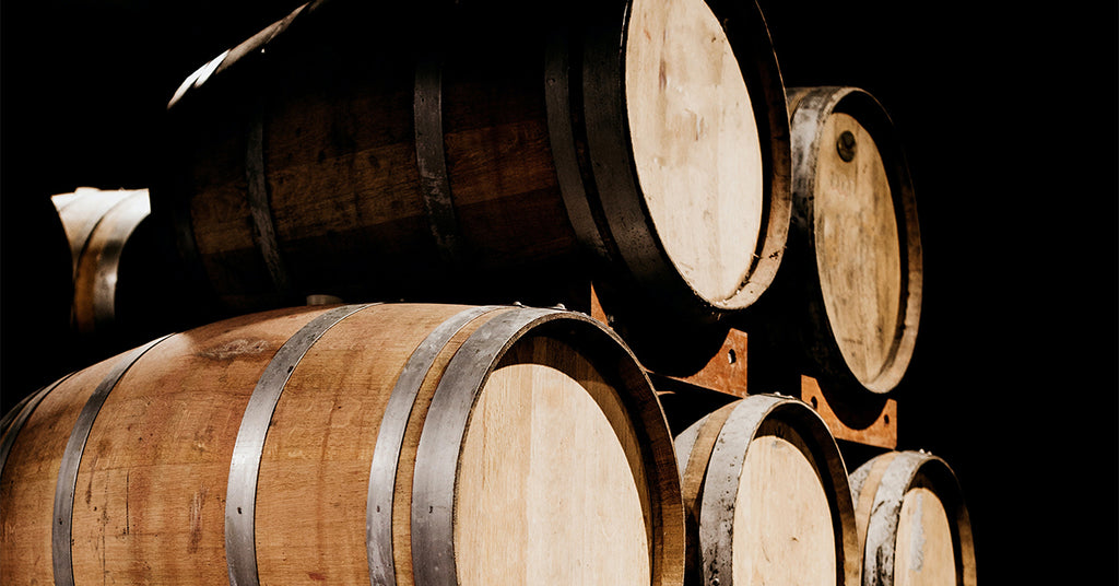 Whiskey-Bourbon Barrels stacked up.
