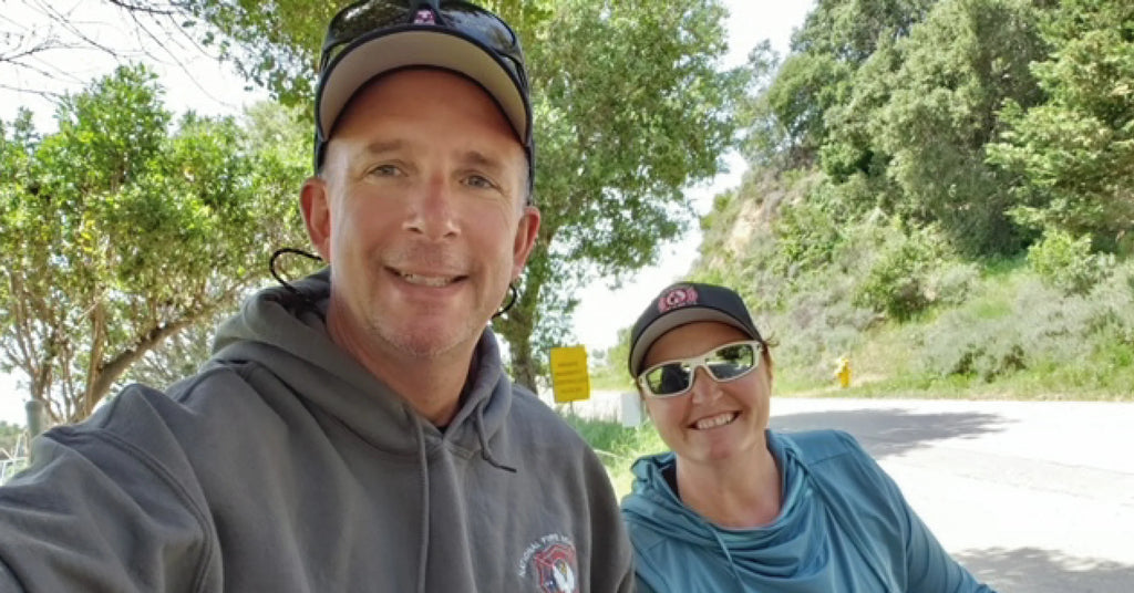 Ken Larsen and his wife smiling.