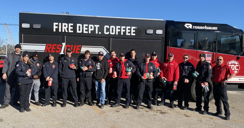 FDC team with the Clarksville, TN fire department with fire truck in the background.