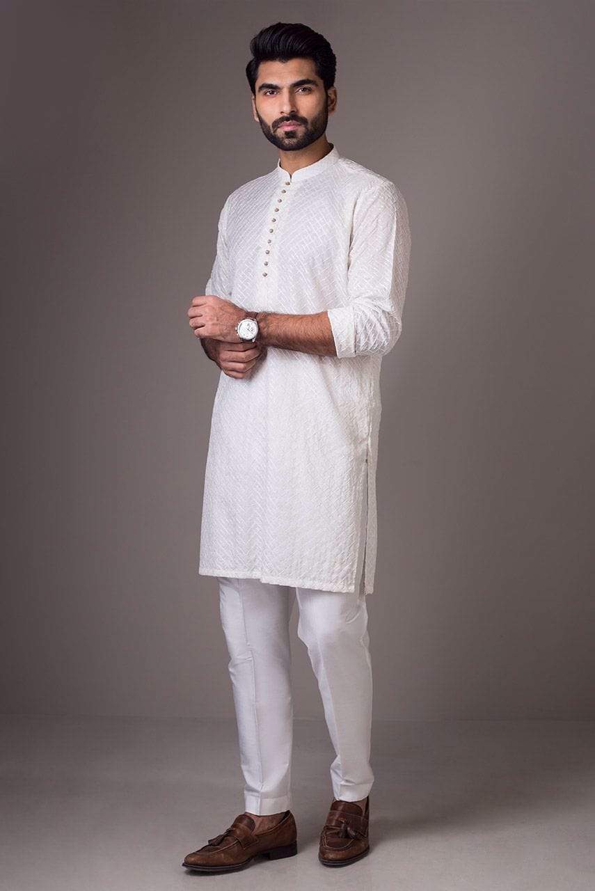 footwear on white kurta pajama