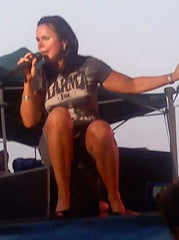 Patty Smyth Wearing Karma Inc Apparel On Stage