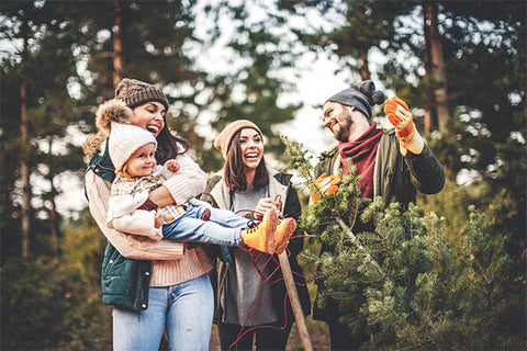 Healthy family outside playing in the cold