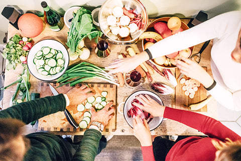 Family gathered around healthy holiday feast