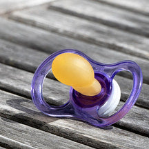 A purple baby pacifier, illustrating for 7 Tips For Writing With Newborns by Tamara M Bailey