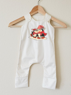 White romper with two penguins on front