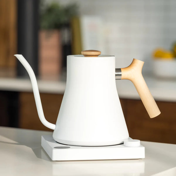 White Stagg electric kettle with light brown handle