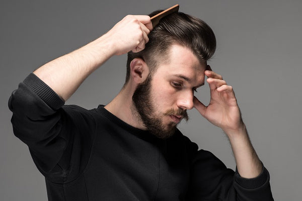 Man styling his hair