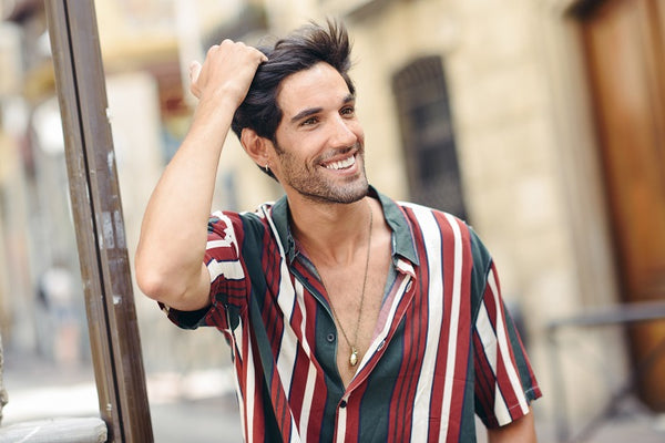 Smiling man with thick hair