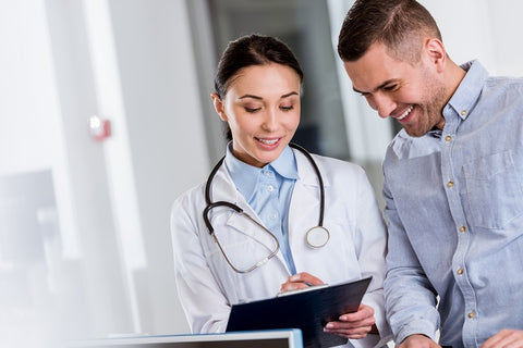 man with a patchy beard consultation to a Doctor