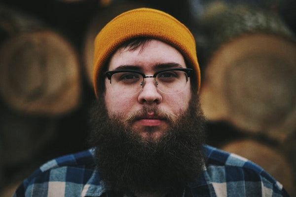 man with curly and wavy beard