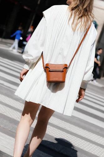 Philippa Ross carries The Strathberry Nano Tote Forest with Stripes