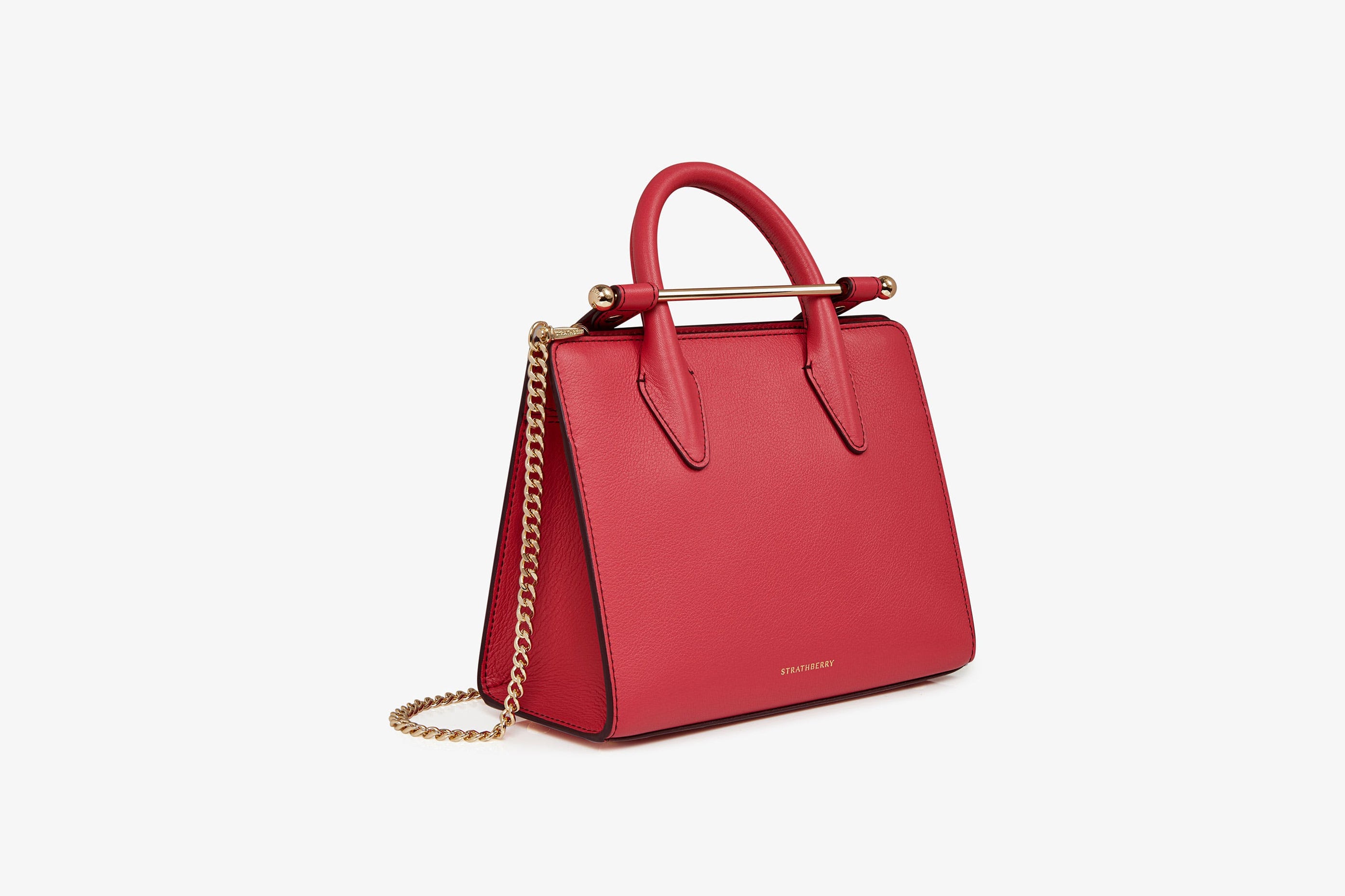 A view showcasing our The Strathberry Mini Tote - Raspberry Red