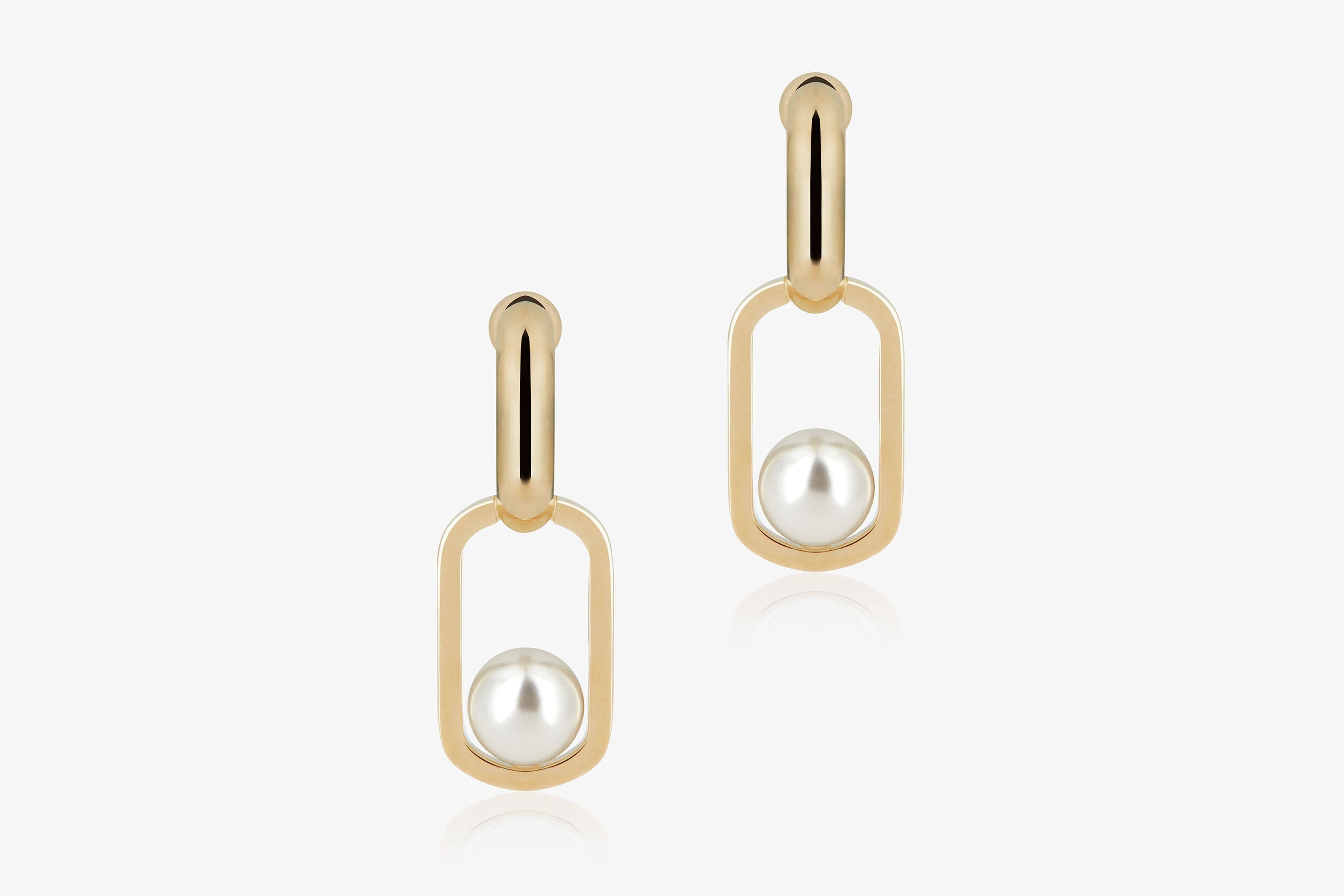 A view showcasing our Lana Pearl Drop Earrings - 22 Carat Gold Gilded