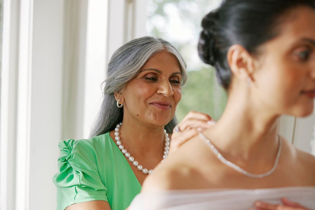 Mother and daughter on daughter's wedding day