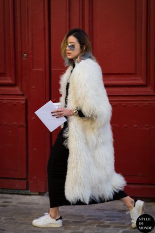 cream long faux fur coat with trainers