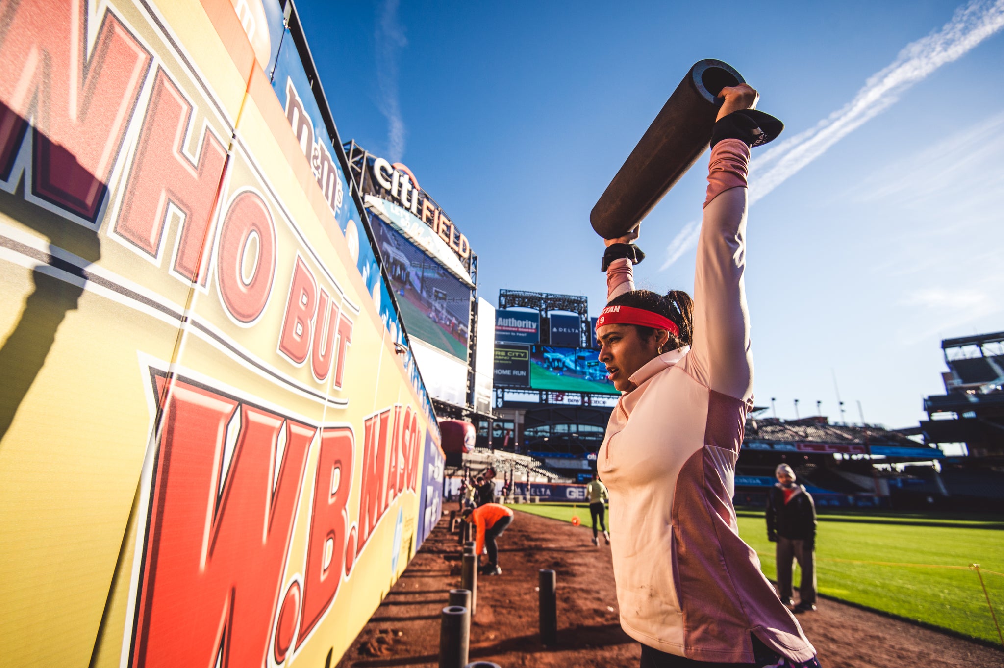 a racer completing a spartan race in november 2022 at citi field