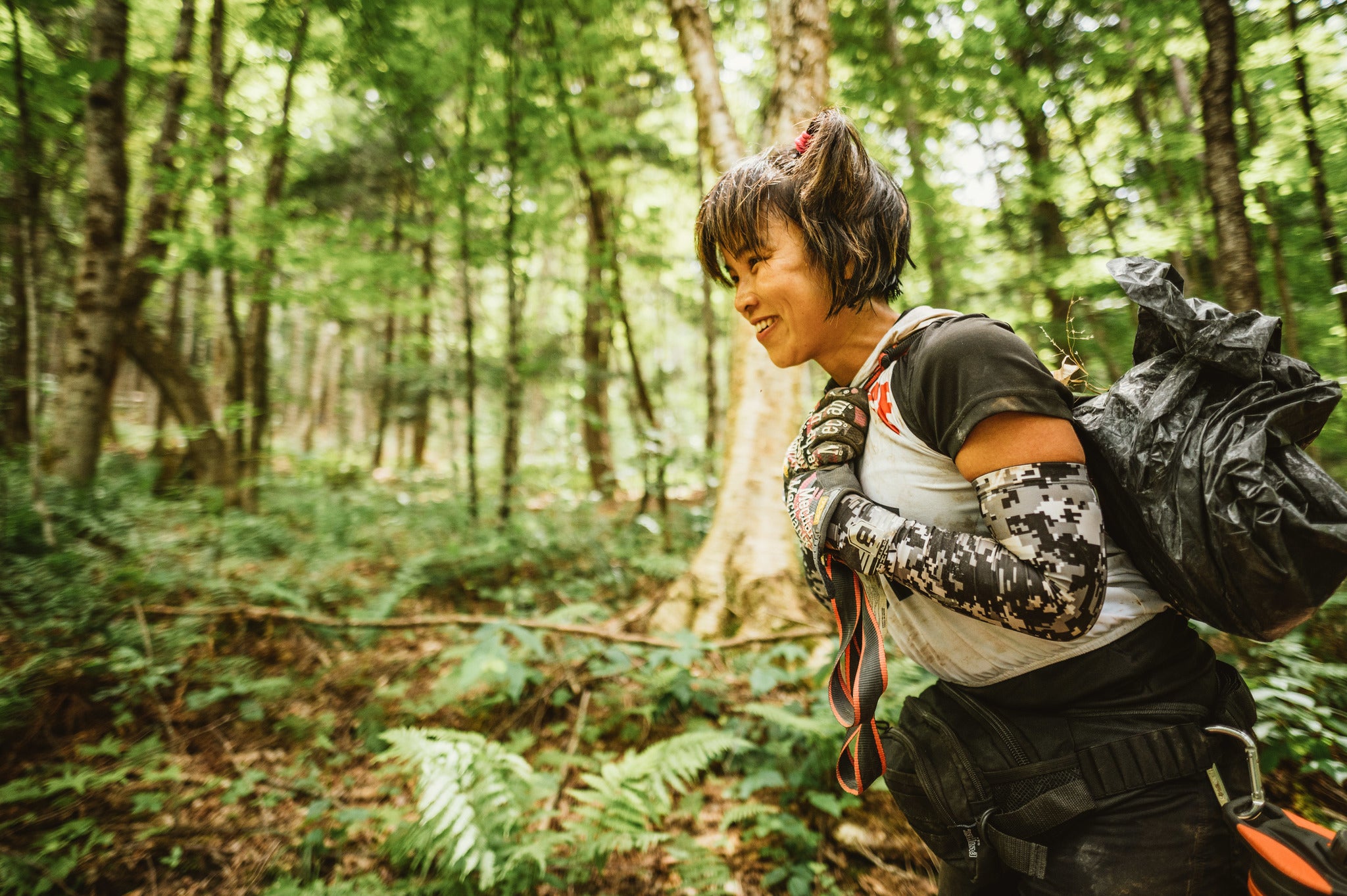 a racer competes in the spartan summer death race