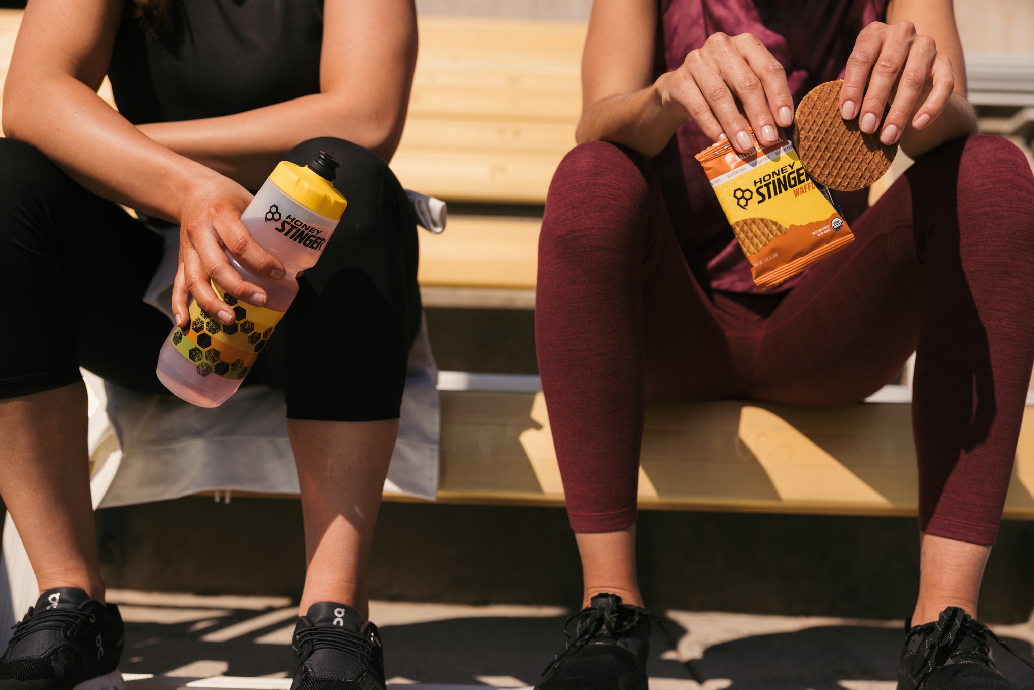 a spartan racer eating honey for workout recovery after a race