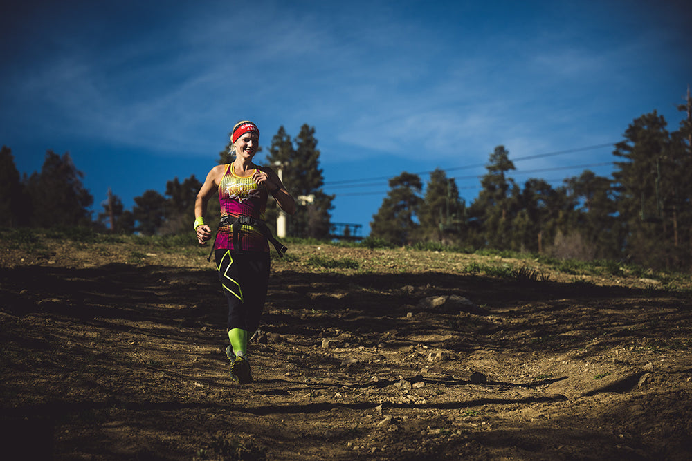 a spartan racer runs at the spartan race in big bear lake california