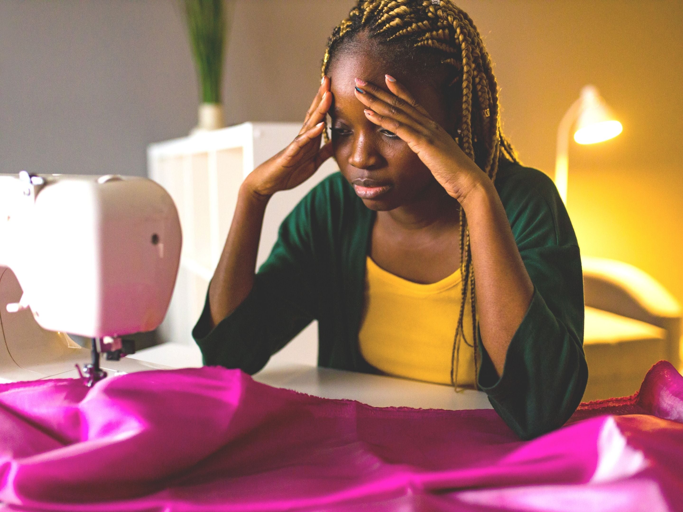 Frustrated Sewist in Front of Sewing Machine