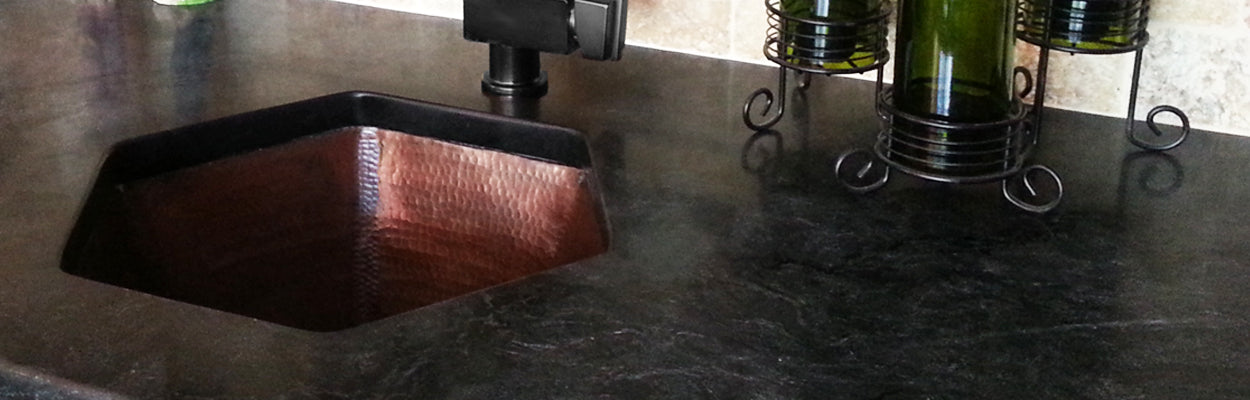 hammered copper sink in bar or prep area